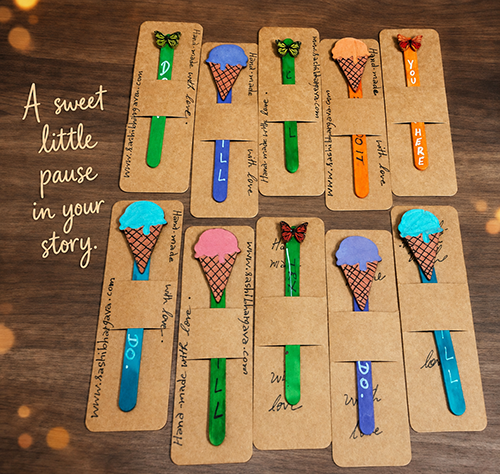 Handmade bookmarks, painted decor pieces and message cards laid out on warm paper